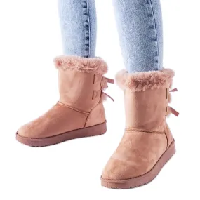 Bottes de neige isolées roses avec nœuds de Borbera