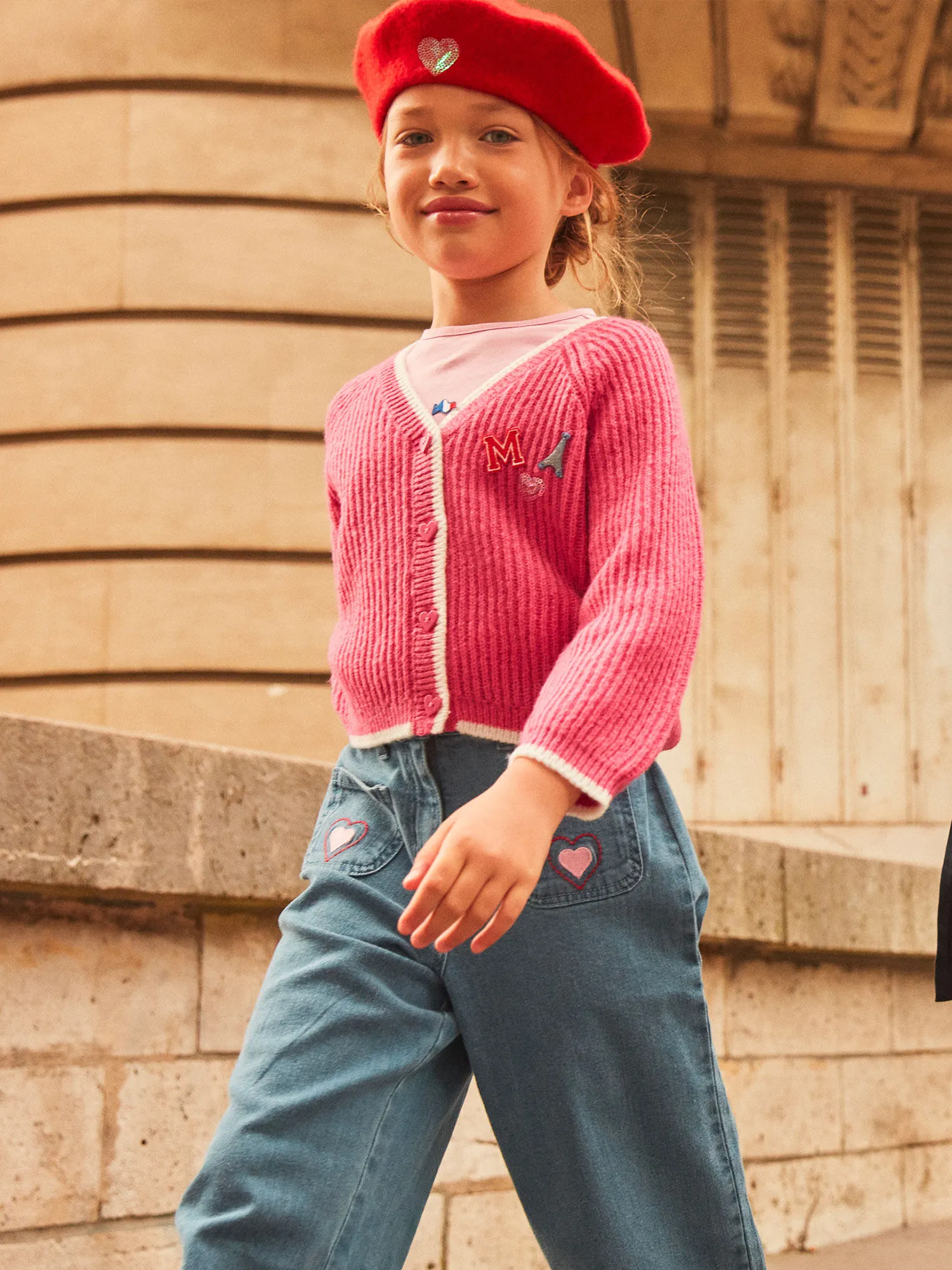 Gilet rose pétunia en tricot